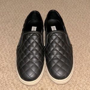 Steve Madden slip on sneakers. black, quilted pattern. size 8.